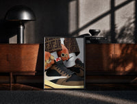 Black-framed Hands with Rings and High-Top Sneakers print on the floor in front of a dark wooden console