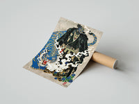 Rolled Hannya mask samurai beside a blue tiger poster beside its crush-resistant kraft shipping tube
