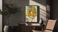 Pumpkin Girl Hearty Greeting poster framed above a fluted sideboard beside a potted tree