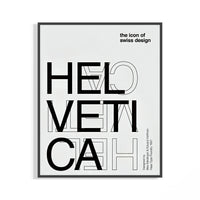 Helvetica Swiss typography poster in black frame showing geometric letter forms in bold black ink
