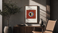 Divided circle with concentric rings poster framed above a fluted sideboard beside an olive tree