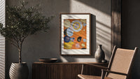 Abstract spirals and snail shells poster framed above a fluted sideboard beside an olive tree