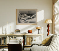 Snowy Japanese village travelers at night print in an oak frame above a mid-century book console with a vintage radio