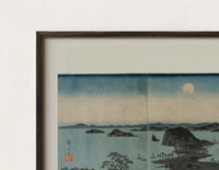 Close-up of the Japanese bay landscape with moon print's dark wood frame corner and archival matte paper
