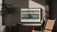 Japanese bay landscape with moon print in a wood frame above a fluted sideboard beside an olive tree