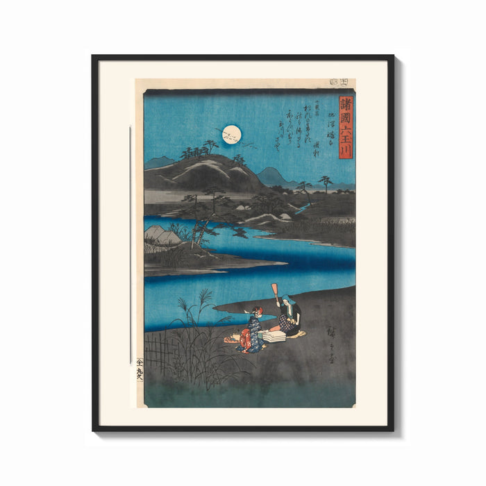 Framed Women washing cloth by moonlit river print shown as a bold statement piece on a clean gallery wall