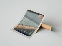 Rolled People crossing bridge in rain poster beside its crush-resistant kraft shipping tube