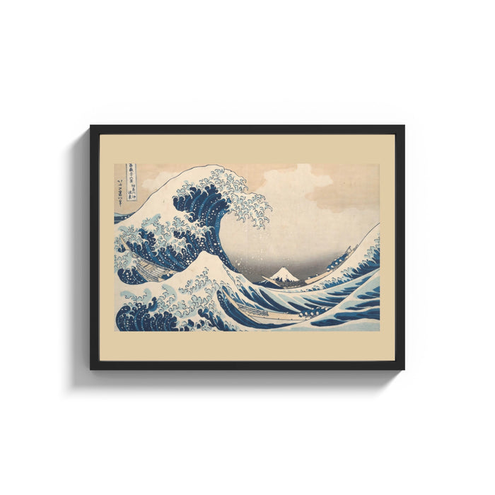 Framed Great wave with boats and Mount Fuji print shown as a wide statement piece on a clean white wall