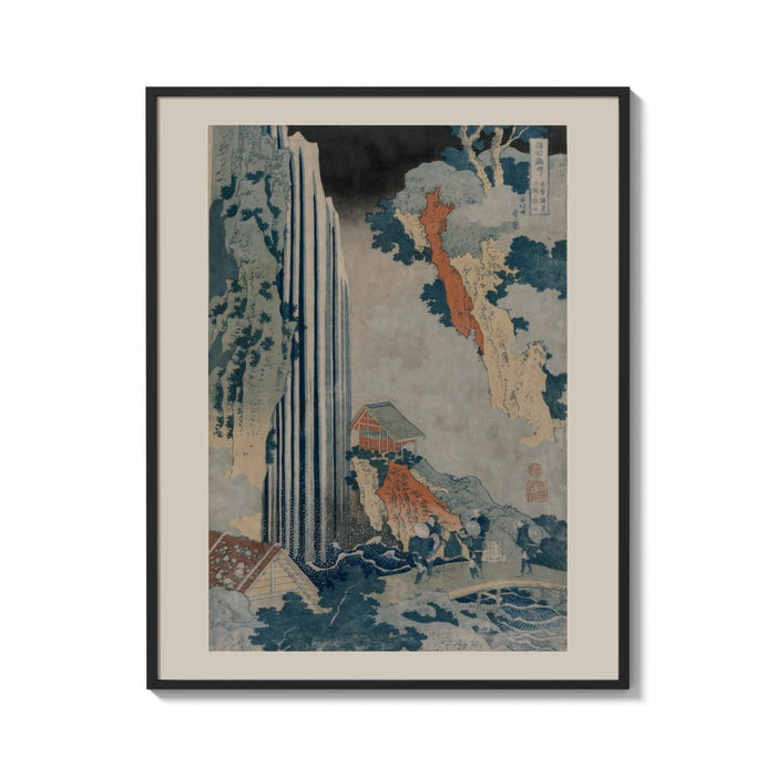 Framed Japanese waterfall with travelers and hut print shown as a bold statement piece on a clean gallery wall