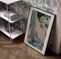 Japanese waterfall with travelers and hut poster in a black frame leaning beside a shelf in a raw-plaster loft
