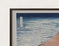 Close-up of the Mount Fuji with snow-capped peak print's dark wood frame corner and archival matte paper