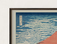 Close-up of the Red Mount Fuji with clouds print's dark wood frame corner and archival matte paper