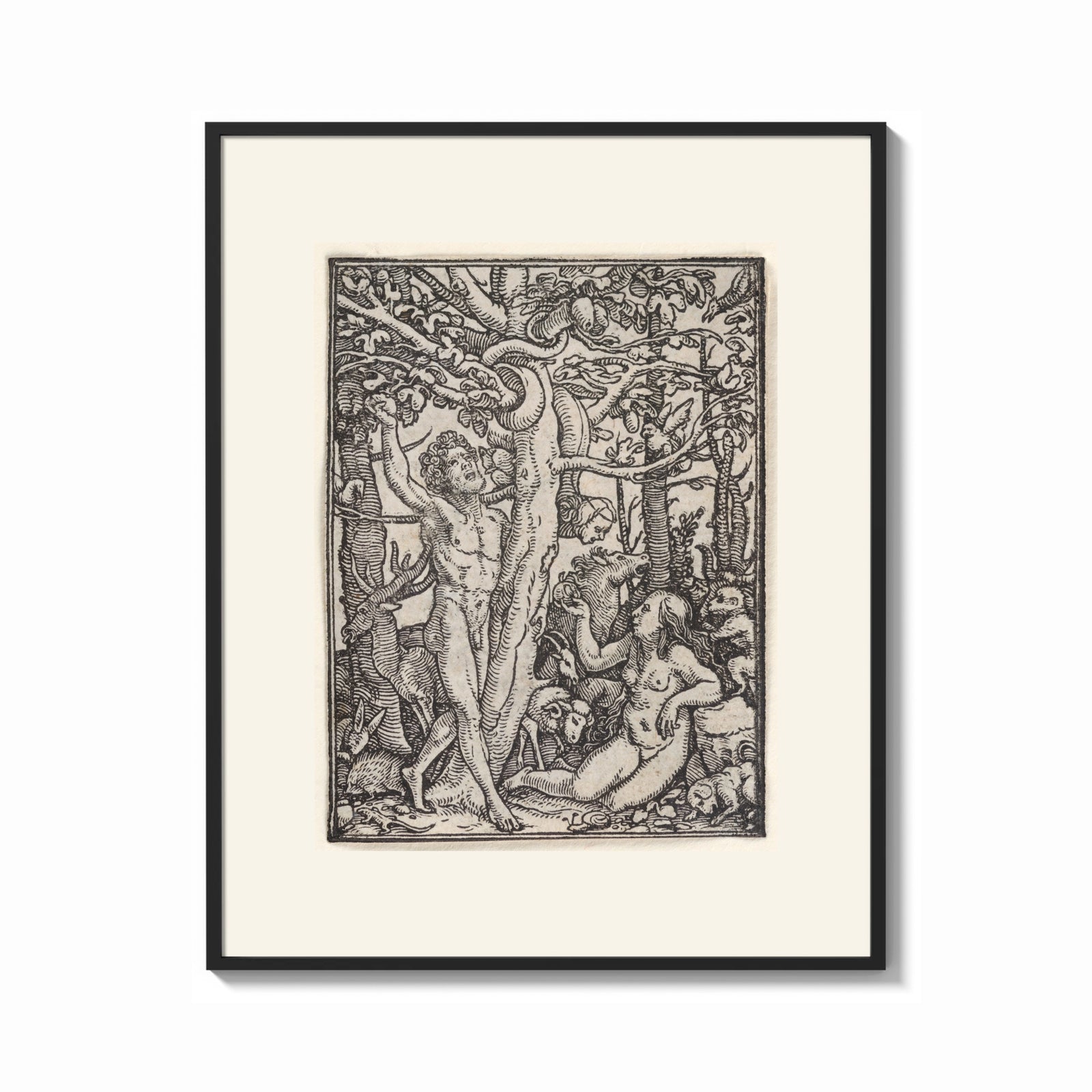 Framed Adam and Eve in Eden print shown as a bold statement piece on a clean gallery wall