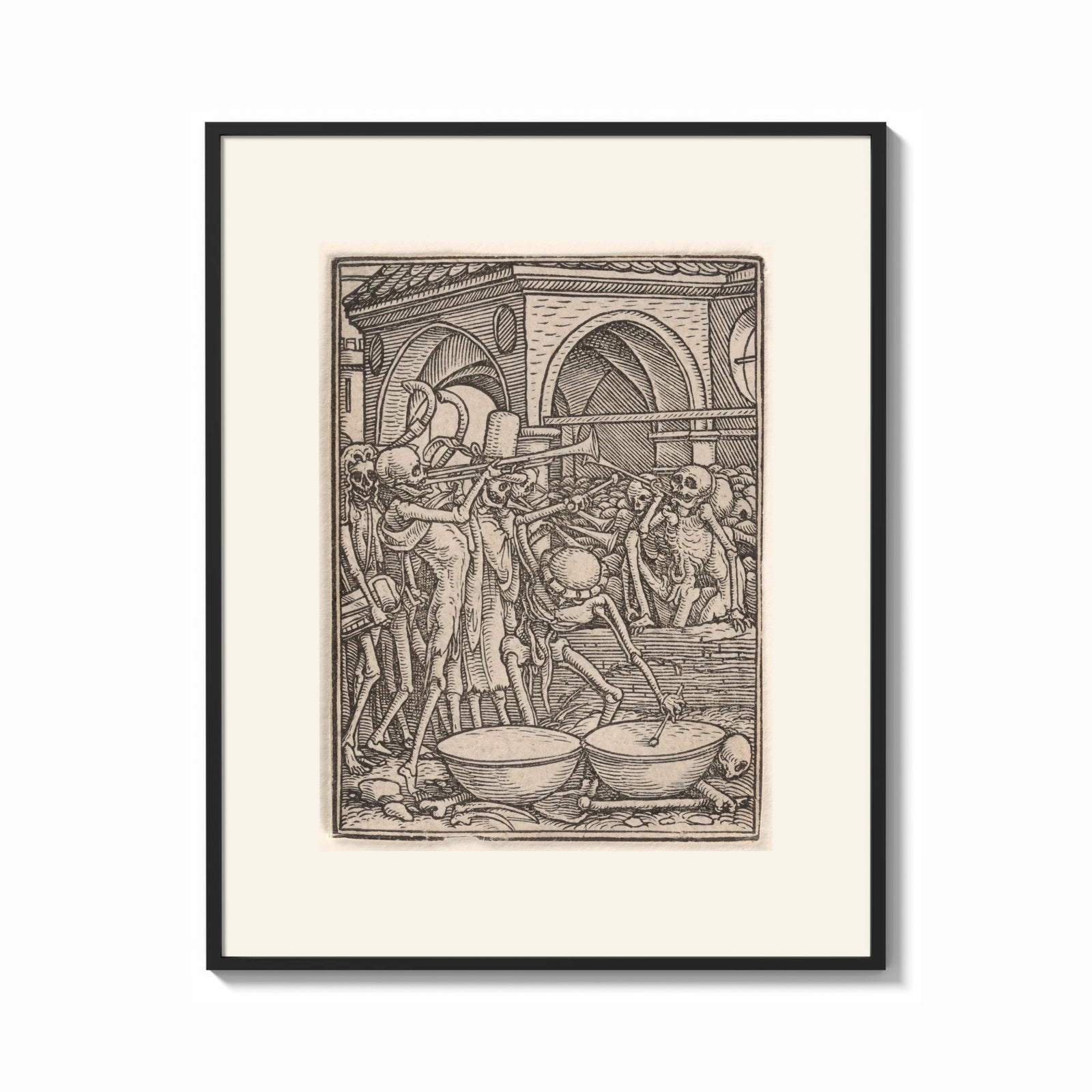 Framed Skeletons dancing playing instruments print shown as a bold statement piece on a clean gallery wall