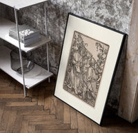 Death confronts two men outdoors poster in a black frame leaning beside a shelf in a raw-plaster loft