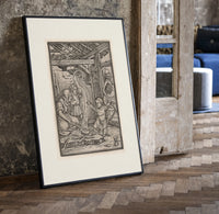 Death with skeleton takes a child print in a black frame leaning beside a vintage door on parquet