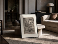 Death visiting seated nobleman print in a black frame leaning on a travertine table in a sunlit lounge
