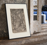 Death crowning enthroned king print in a black frame leaning beside a vintage door on parquet