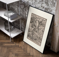 Nobleman confronted by skeletal Death poster in a black frame leaning beside a shelf in a raw-plaster loft