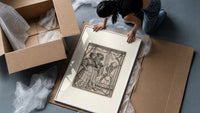 Death dancing with noble couple framed print being unpacked from protective bubble wrap and a box