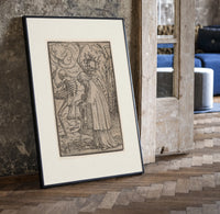 Death dancing with old woman print in a black frame leaning beside a vintage door on parquet