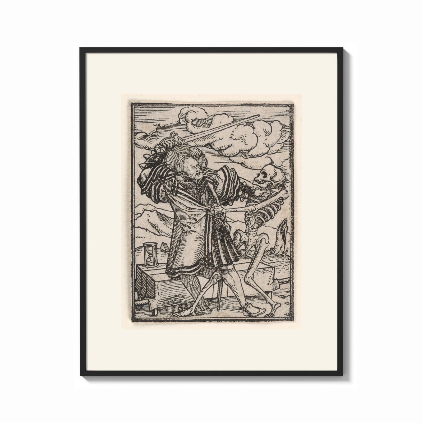 Framed Death dancing with a man print shown as a bold statement piece on a clean gallery wall