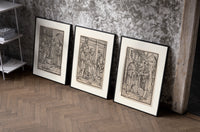 Death visits people in three scenes set of three black-framed prints leaning against a raw-plaster wall