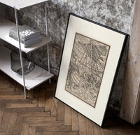 Ship in stormy sea with figures poster in a black frame leaning beside a shelf in a raw-plaster loft