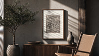 Death leading a bishop poster framed above a fluted sideboard beside an olive tree