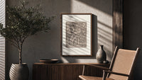 Death expelling Adam and Eve from Eden poster framed above a fluted sideboard beside an olive tree