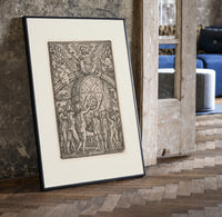 God enthroned above celestial globe print in a black frame leaning beside a vintage door on parquet