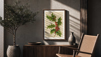 Holly Christmas Greetings poster framed above a fluted sideboard beside a potted tree