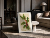 Holly Christmas Greetings print on the floor, leaning against a travertine table
