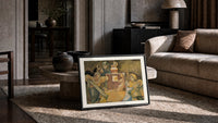 Four robed figures gathered around a table print in a slim black frame leaning on a travertine coffee table