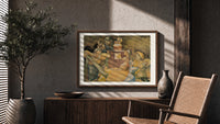 Four robed figures gathered around a table print in a wood frame above a fluted sideboard beside an olive tree