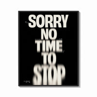 Framed Sorry No Time To Stop print shown as a bold statement piece on a clean gallery wall