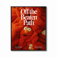 Framed Off the Beaten Path KAWS-Inspired Red Plush print shown as a bold statement piece on a clean gallery wall