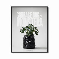 Framed Nike x Monstera Garbage Bag print shown as a bold statement piece on a clean gallery wall