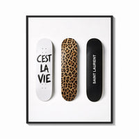 Framed Saint Laurent Cest La Vie Skateboards framed poster print shown as a bold statement piece on a clean gallery wall