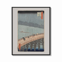 Framed Hiroshige Sudden Shower Ohashi print shown as a bold statement piece on a clean gallery wall