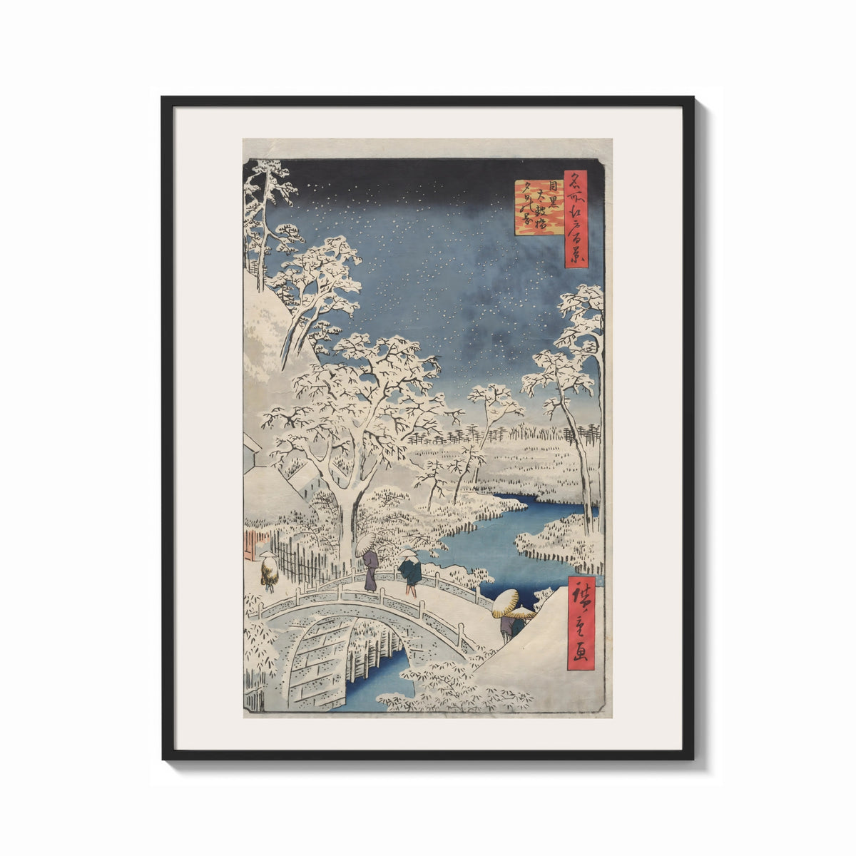 Framed Hiroshige Meguro Bridge in Snow print shown as a bold statement piece on a clean gallery wall