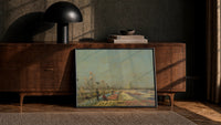 workers tending a colorful tulip field vintage art print print in a black frame leaning against a walnut console in lamplight