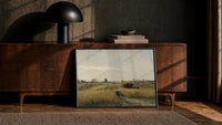 harvest field with a gleaning woman and hay wagon vintage art print print in a black frame leaning against a walnut…