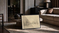 tall ships in a harbor vintage art print print in a slim black frame leaning on a travertine coffee table
