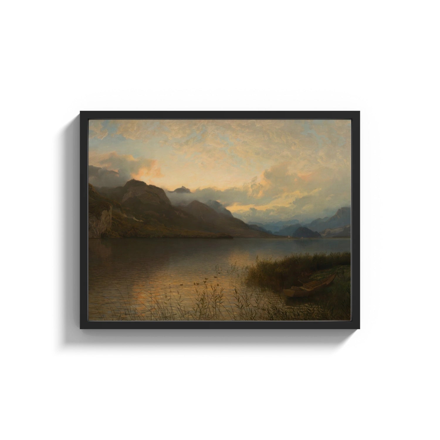 Framed mountain lake at sunset with rowboat vintage art print print shown as a wide statement piece on a clean white wall