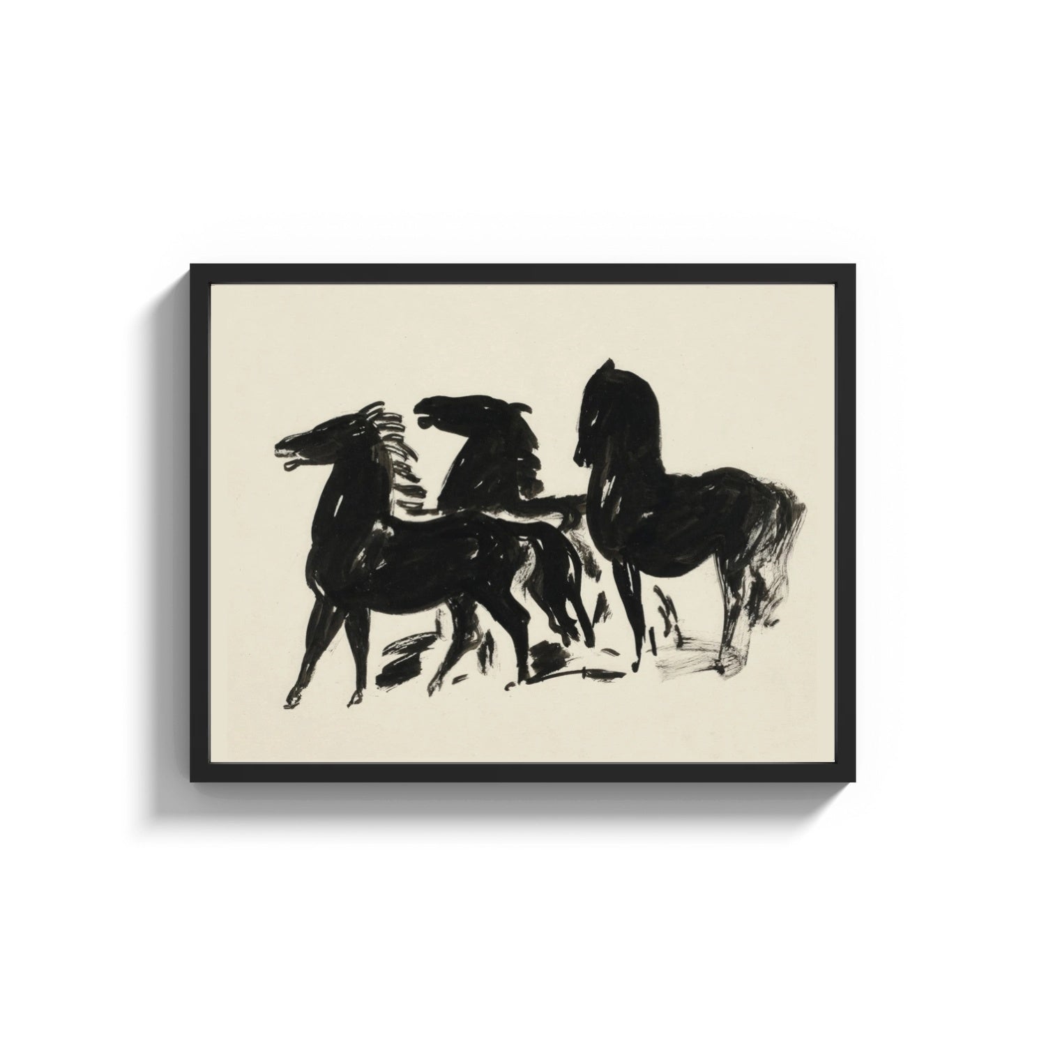 Framed three horses in bold silhouette vintage art print print shown as a wide statement piece on a clean white wall