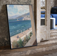 Mediterranean coastal promenade seen from balcony vintage art print print in a black frame leaning beside a vintage door…