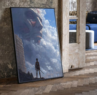 Attack on Titan Colossal framed poster print in a black frame leaning beside a vintage door on parquet