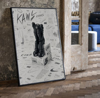 KAWS Companion Nike Swoosh Sketch framed poster print in a black frame leaning beside a vintage door on parquet