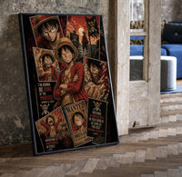 Monkey D. Luffy One Piece Wanted framed poster print in a black frame leaning beside a vintage door on parquet